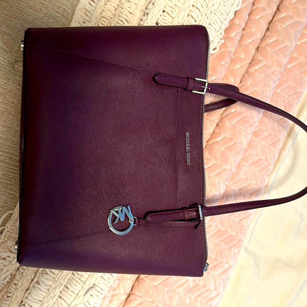 Michael Kors hard to find purple bag used but in perfect condition